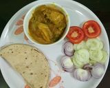 A picture of step 10 of Chicken masala.