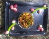 A picture of step 10 of Karonda pickle.