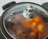 A picture of step 3 of Punjabi chicken masala.