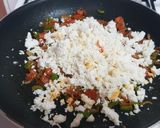A picture of step 3 of Schezwan paneer bhurji chilla.