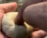 A picture of step 16 of Dal Bafla Baati Churma.