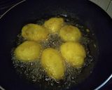 A picture of step 3 of Deep fried jacket potatoes.