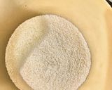 A picture of step 1 of Broken Wheat Dhokla.