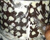 A picture of step 7 of Polka Dot Chocolate Icing cake.