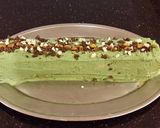 A picture of step 26 of Chocolate Cake Roll with Pistachio Cream Filling and Frosting.