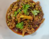 A picture of step 11 of Spicy Gobhi Matar.