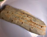 A picture of step 6 of Tortilla chicken wrap.