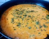 A picture of step 3 of Paneer Butter Masala with fresh cream.