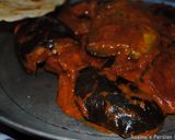 A picture of step 13 of Eggplatns onions with tomato sauce.