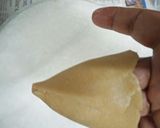 A picture of step 23 of Atta Sooji Samosa.