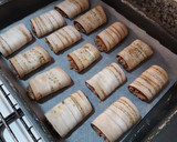Foto del paso 7 de la receta: Rollitos de berenjena rellenos de boloñesa y gratinados con bechamel