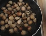 Foto del paso 4 de la receta: Arroz integral meloso con pulpo y berberechos frescos