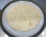 A picture of step 3 of Sausage and onion wrap.