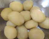 A picture of step 1 of Niramish Aloo Dum.