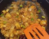 Foto del paso 4 de la receta: Arroz con bacalao ajos tiernos y coliflor