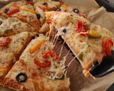 A picture of step 13 of Heart shaped Veg pizza.
