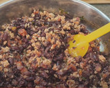 Foto del paso 5 de la receta: Pimientos rellenos de pollo y arroz negro, especial Halloween