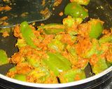 A picture of step 11 of Bharela Bor Marcha Nu Shaak/ capsicum curry.