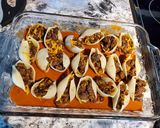A picture of step 5 of Stuffed Enchilada Shells.