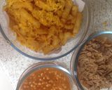 A picture of step 7 of Pulled BBQ pork with Beans and Cheesy Chips 💜.