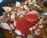 Foto del paso 3 de la receta: Paella de calamaritos y magro