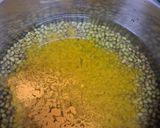 A picture of step 1 of Whole Moong Dal Curry.