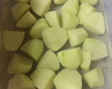 A picture of step 2 of Alu baigan.