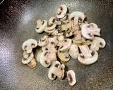 A picture of step 2 of Mushroom and Pineapple Fried Rice.
