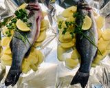Foto del passaggio 4 della ricetta Spigola al cartoccio con vongole