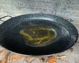 A picture of step 1 of Paella Valenciana.