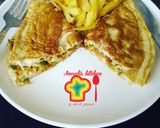 A picture of step 8 of Veggies omelette with fried potatoes.