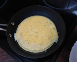 Foto del paso 2 de la receta: Huevos revueltos al ajillo con bacon y tostadas