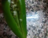 A picture of step 2 of Bharwa achaari mirch.