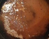 A picture of step 2 of Ulli theeyyal (shallots cooked in roasted coconut gravy and tamarind juice).