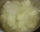 A picture of step 1 of Cheesey Spicy Garlic Potato.