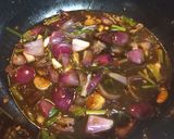 A picture of step 4 of Hong Kong Chicken with light and dark Soy Sauce.