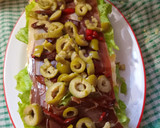 Foto del paso 8 de la receta: PIONONO RELLENO DE JAMÓN SERRANO, HUEVO, ACEITUNAS, Y MORRÓN 🥰🥰🥰😋😋😋😋