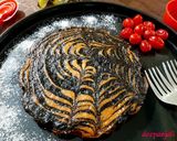 A picture of step 10 of Zebra Cake.