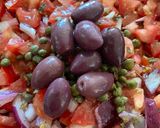 A picture of step 5 of Dakos salad | Cretan salad.