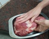 A picture of step 1 of Pork Shoulder with Mustard, Spiced Plums, and Orange Sweet Potato Mash.