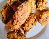 Foto del paso 5 de la receta: Alitas y muslitos de pollo fritos