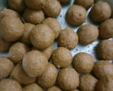 A picture of step 11 of Aatta besan pinni (ladoo).