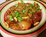 A picture of step 5 of Rajsthani (jaipuri)sabut pyaz ki sabji and tikkad.