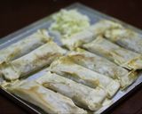 A picture of step 2 of Baked Veggie spring Rolls in Red Sauce.