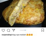 Foto langkah ke 6 dari resep Roti isi ala pizza.