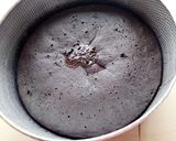 A picture of step 2 of Whipped cream frosted chocolate cake.