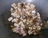 Foto langkah ke 3 dari resep Tumis kembang Daun pepaya,Teri dan tempe.