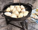 Foto del paso 7 de la receta: Calamares rellenos en salsa de mariscos a la crema