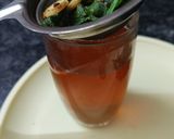 A picture of step 2 of Mint leaves and Lemongrass Tea.