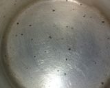 A picture of step 3 of Jalebi with hot milk.